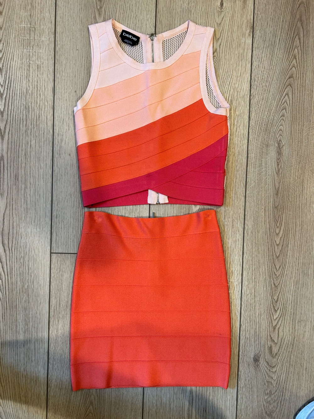 bebe Peach-Pink Bandage Dress with Gold Zip Detail
